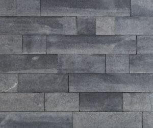 A closeup photo of Starlight Black Granite in a sawn dimensional cut.