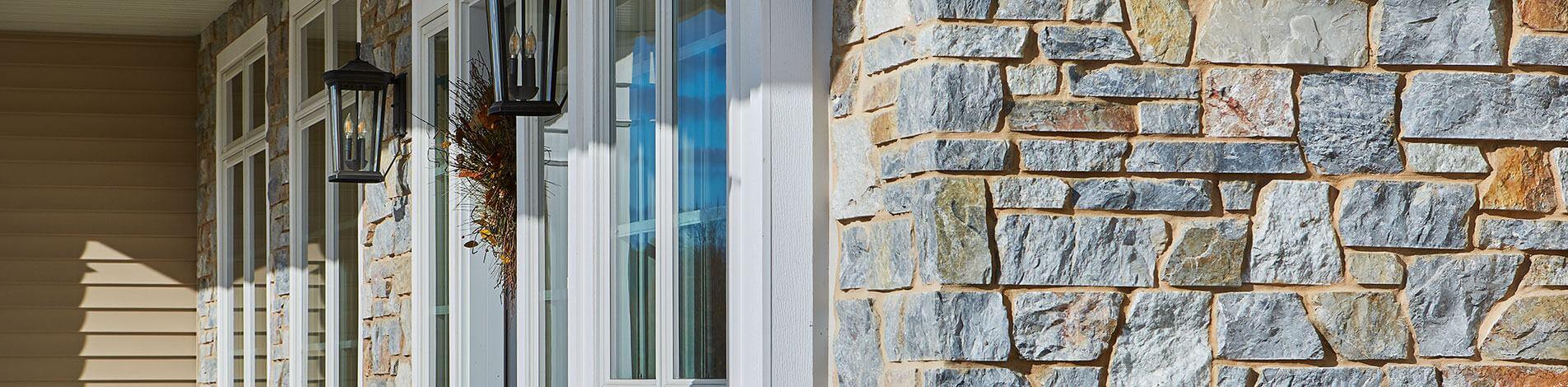 Kafka Granite Gun Metal Thin Stone Veneer on the exterior of a home