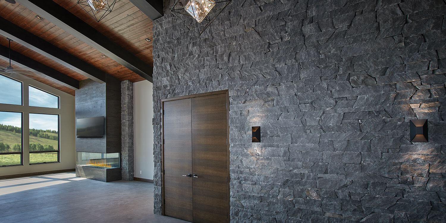 Kafka's Ebony Glitter Dimensional Drystack Thin Stone Veneer walls and fireplace accents