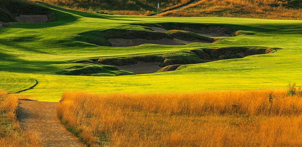 The Erin Hills golf course is shown with beautiful wax polymer pathway mix connecting all of the holes.