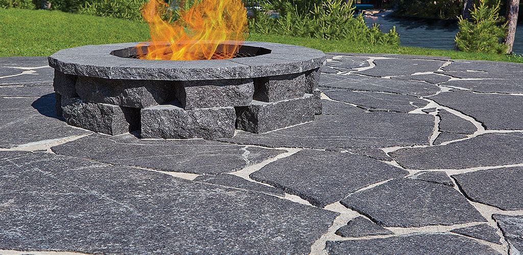 Starlight Black Granite Sawn Cut Drywall and custom-cut Starlight Black Granite Caps form a relaxing fire pit.