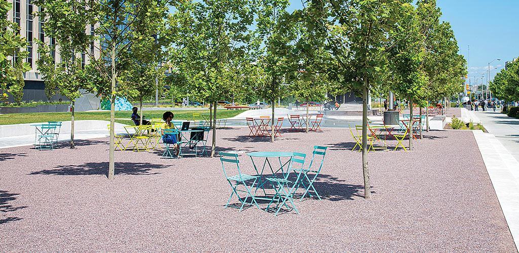 The Richard G. Lugar Plaza is shown with beautiful Antique Rose Marble Stabilized Pathway Mix covering the seating areas.