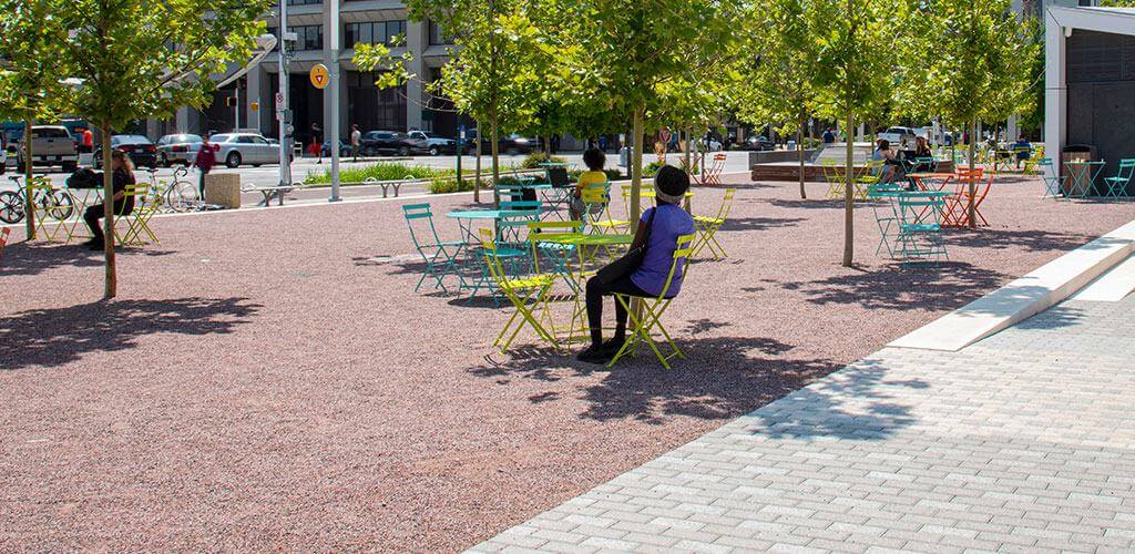 The Richard G. Lugar Plaza is shown with beautiful Antique Rose Marble Stabilized Pathway Mix covering the seating areas.