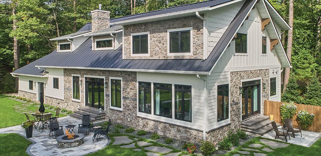 A modern farmhouse uses generous amounts of Ebony Glitter Thin Stone Veneer.