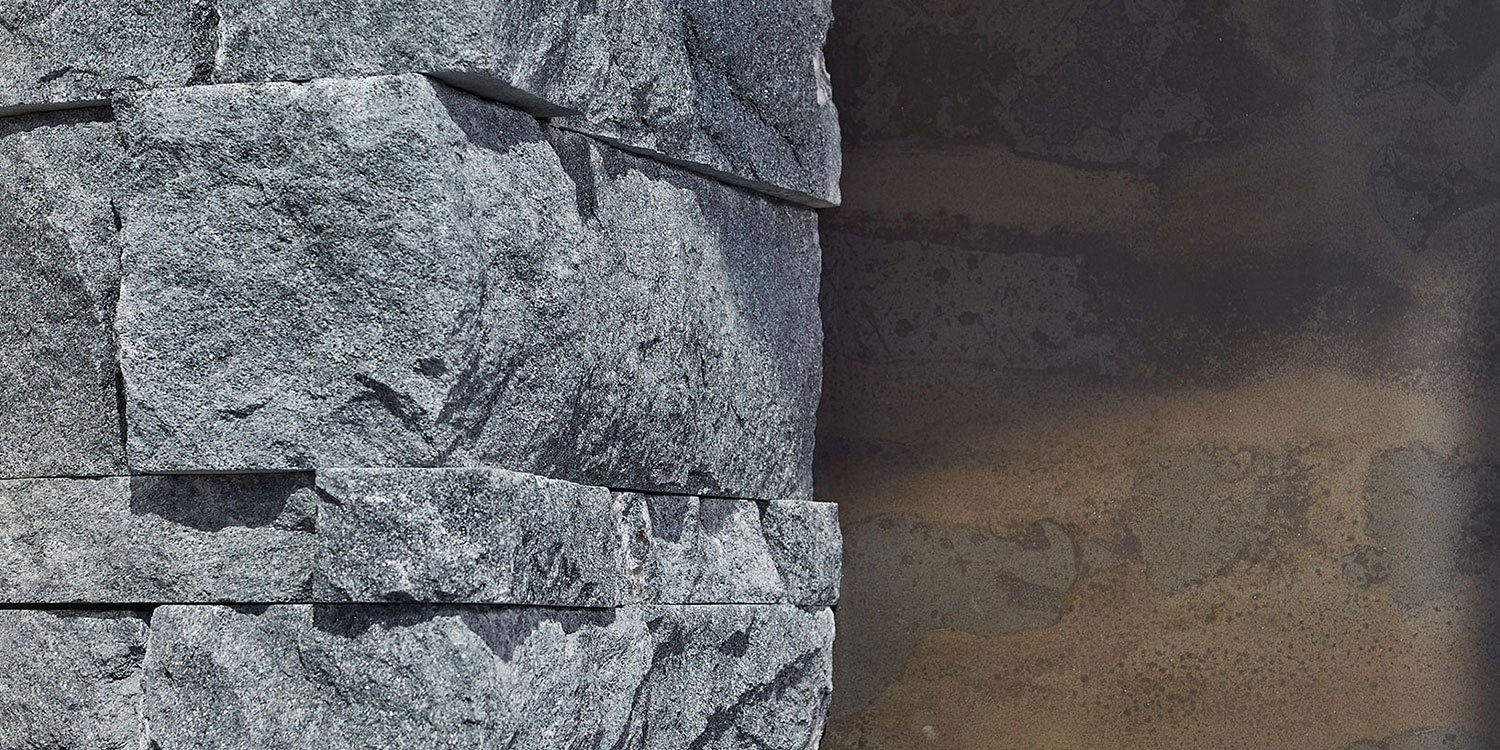 Kafka's Ebony Glitter Dimensional Drystack Thin Stone Veneer walls and fireplace accents