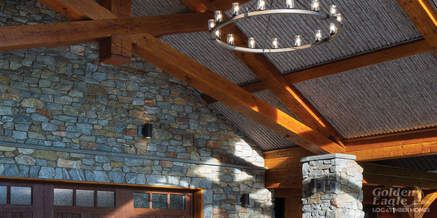 Kafka's Gun Metal Marble Rustic Thin Stone Veneer walls, columns, and coping, with Imperial Gray Granite caps and sills