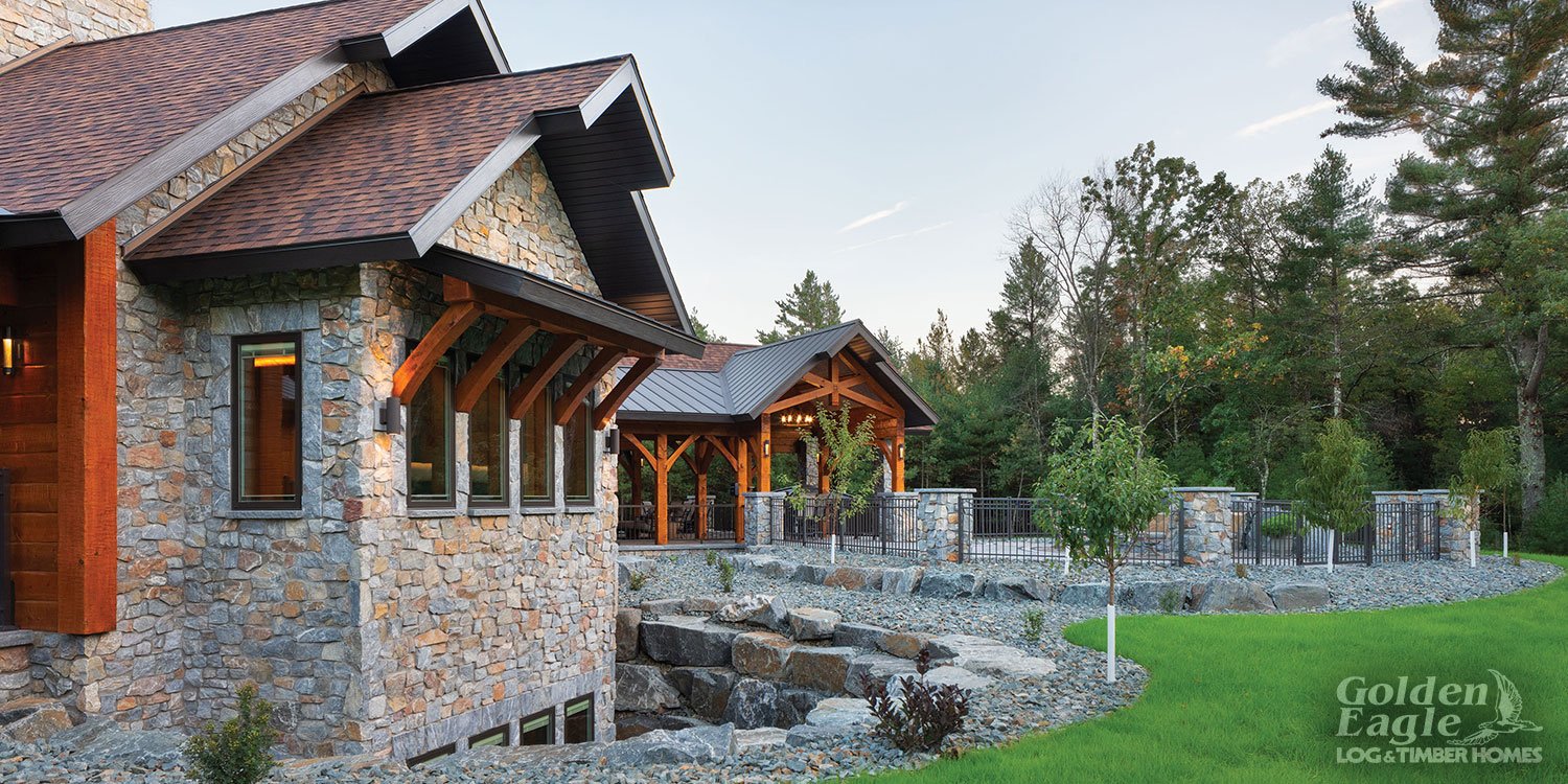 Kafka's Gun Metal Marble Rustic Thin Stone Veneer walls, columns, and coping, with Imperial Gray Granite caps and sills