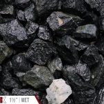 Jett Black Granite Bulk Landscape Stone shown wet